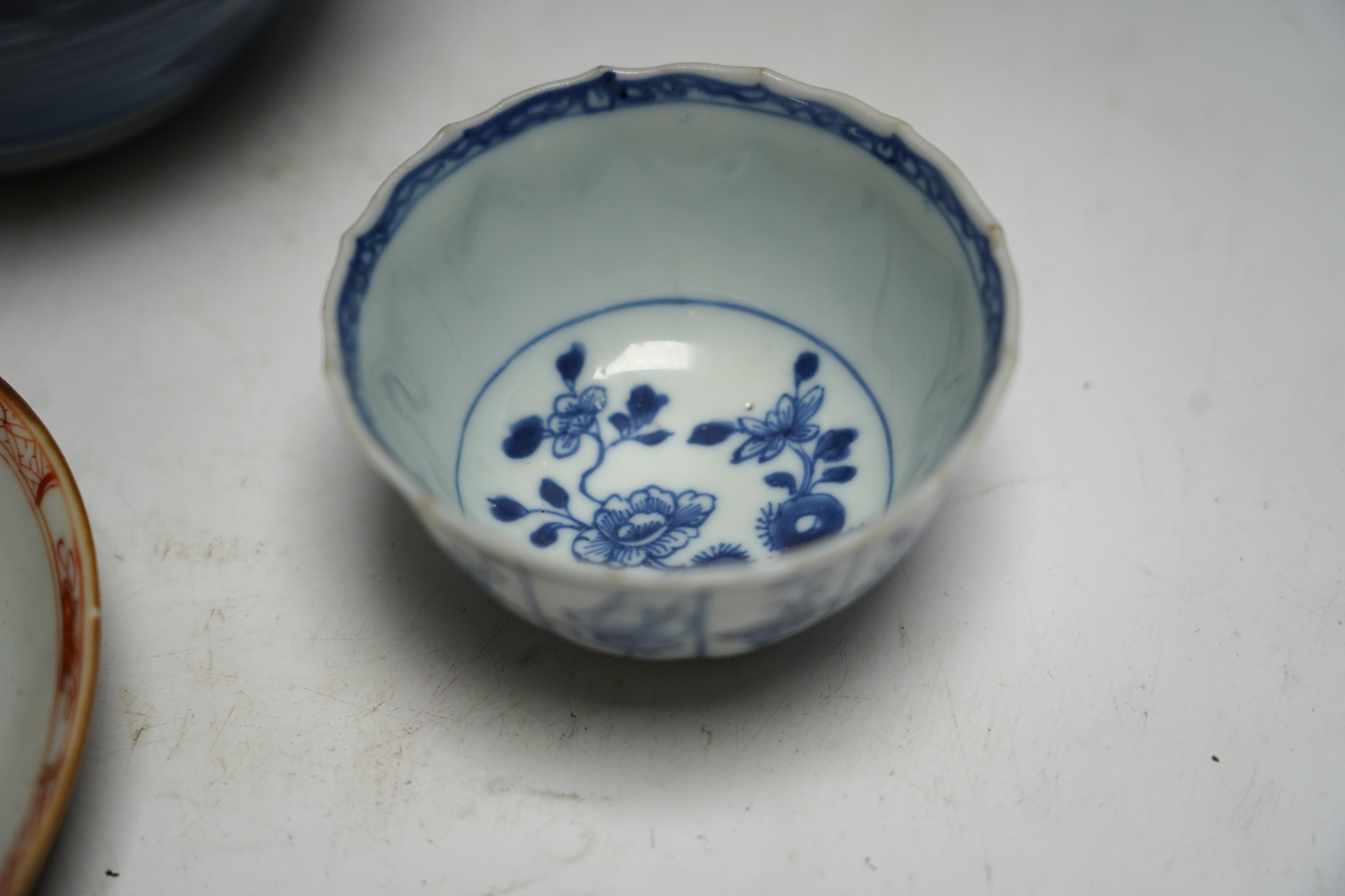A group of 18th century Chinese and Japanese porcelain including blue and white bowls and jar with hardwood cover, largest 19cm in diameter